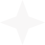 White four-pointed star on a black background.