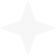 White four-pointed star on a black background.